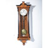 Vienna regulator type wall clock, double weight driven movement striking on a gong, 108cm.