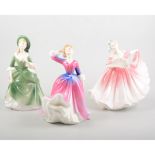 Twelve Royal Doulton figurines, including: HN2698 Sunday Best, HN3307 Elaine, HN3495 Annette,