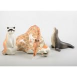 Collection of six Soviet porcelain animal models, Seated Giraffe, Polar Bear, Panda, Raccoon,