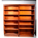 Three freestanding mahogany effect open bookcases, adjustable shelving, each width 91cm, depth 28cm,