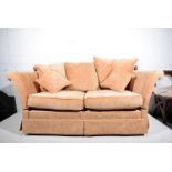 Modern Knoll type sofa, the back and arms with stained beechwood finials, loose cushions,