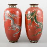 Pair of Chinese cloisonne ovoid vases, decorated with dragons, (damaged), 31cm.