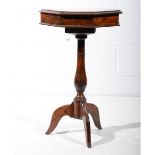 Octagonal walnut work table, moulded outline,