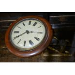 Mahogany cased post clock, mahogany case diameter 32cm.