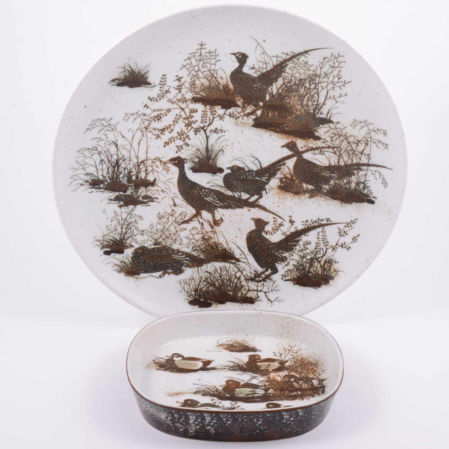 Nils Thorsson for Royal Copenhagen, a stoneware charger and dish, circa 1975,