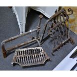 Pair of cast iron andirons hight 50cm, a wrought iron grate and another grate.
