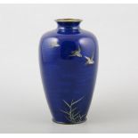 Japanese cloisonne blue ground vase, decorated with birds in flight, white metal mounts, 18cms.