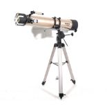 Tasco Luminova 900mm x 114mm reflector telescope.