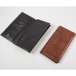 Two Mulberry leather wallets, one in tan leather,