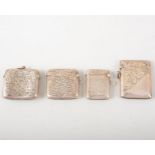 Four hallmarked silver vesta match cases, various scroll and leaf engraved designs,