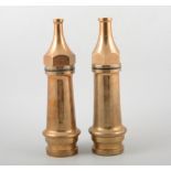 Two brass fireman's hose nozzles, 3/8's and 5/8's.