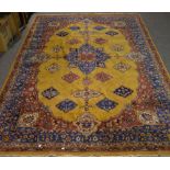 Persian carpet with central quatrefoil medallion, on an old gold ground with multiple florettes,