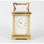 Brass cased carriage clock, the dial signed Robbins, 13cm.