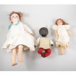 A basket of dolls, two German bisque head dolls, a black hard celluloid doll, two Sindy dolls (a.f).