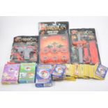 Thundercats toys in blister packs, along with a selection of vintage Pokemon cards, one box.