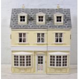 Dolls House; 60cm wide and 66cm tall, along with a selection of furniture and accessories.