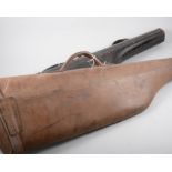 Two leather "leg of mutton" gun cases,