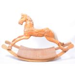 Modern pine rocking horse, sleigh base, length 183cm.