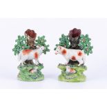 Near pair of Staffordshire pearl glazed earthenware bocage spill vases,