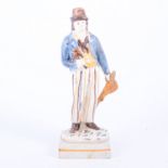 Prattware glazed earthenware figure of a sailor, early 19th century, modelled standing,