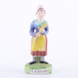 Staffordshire pearl glazed earthenware figure BY A BROOM, circa.