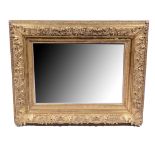 Wall mirror, rectangular plate, gilt carved acanthus and flower and scroll frame, 76cm x 94cm.