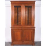 Reproduction walnut bookcase, glazed top, base with drawer and cupboards, width 127cm, depth 54cm,