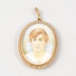 An oval portrait miniature, hand painted young lady with blue bow in her hair, 38mm x 28mm,