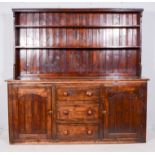 Early Victorian stained pine dresser base, rectangular top,