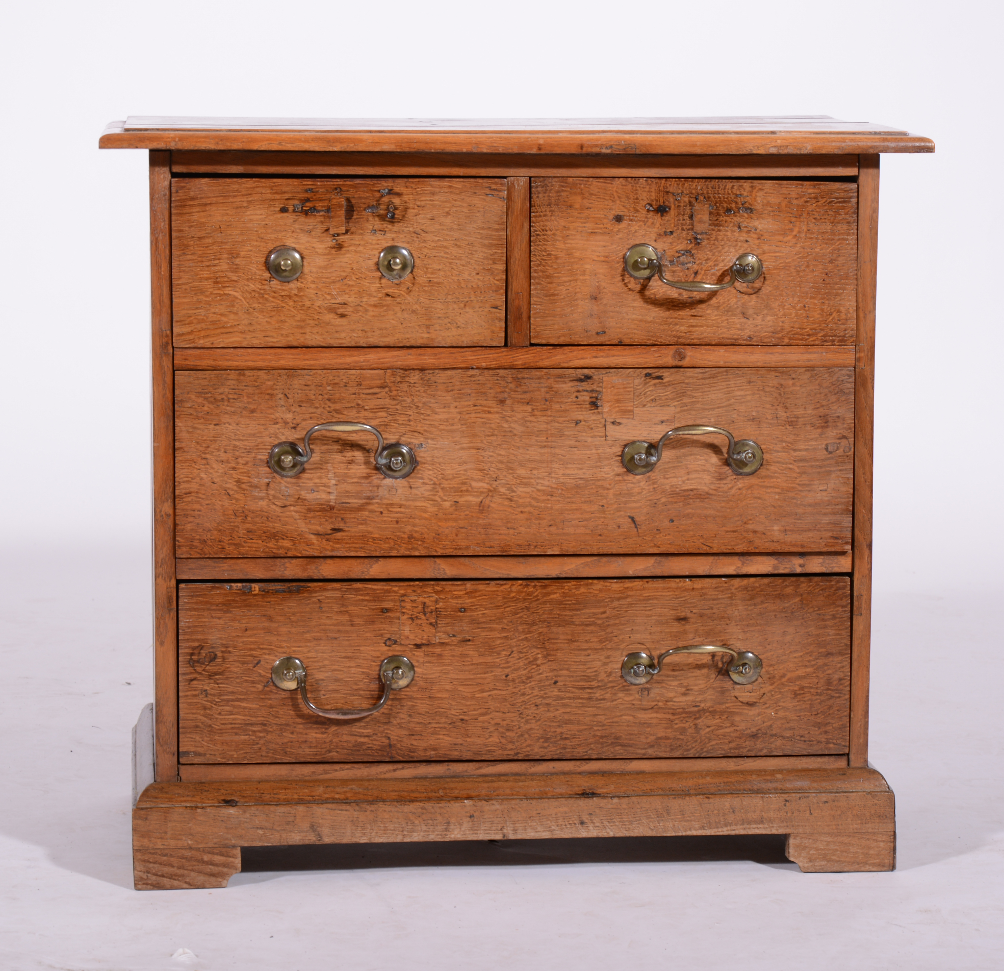 Small oak chest of drawers, fitted with two short and two long drawers, bracket feet, 69cm, - Image 2 of 2