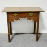 Oak side table, rectangular boarded top, frieze drawer above a shaped apron, moulded legs,