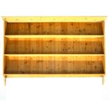 Pine delft rack, moulded cornice, panelled back with three fixed shelves, width 192cm, depth 25cm,