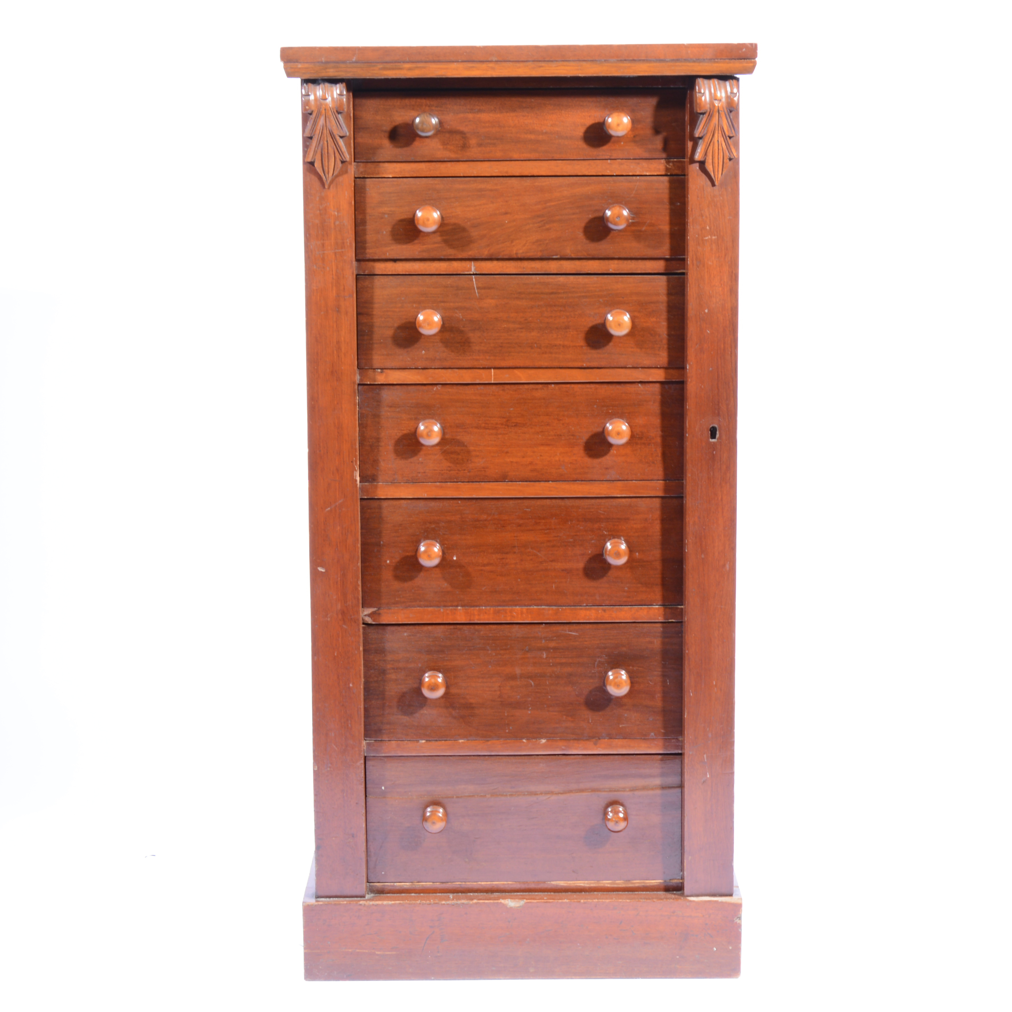Victorian mahogany Wellington chest, rectangular top above carved corbels, seven drawers,