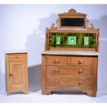 Pine washstand, raised tile back with a mirror pediment, marble top, two short drawers,