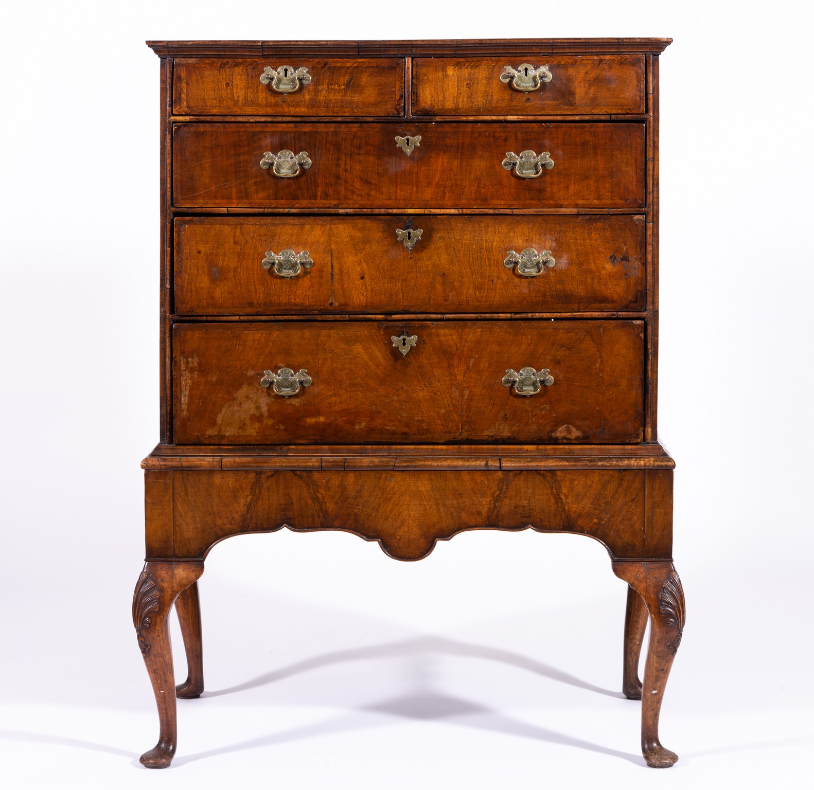 George II walnut chest of drawers, on a later stand, substantial alterations,