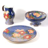 Royal Doulton pottery pedestal bowl, painted with flowers; and a similar large plaque,