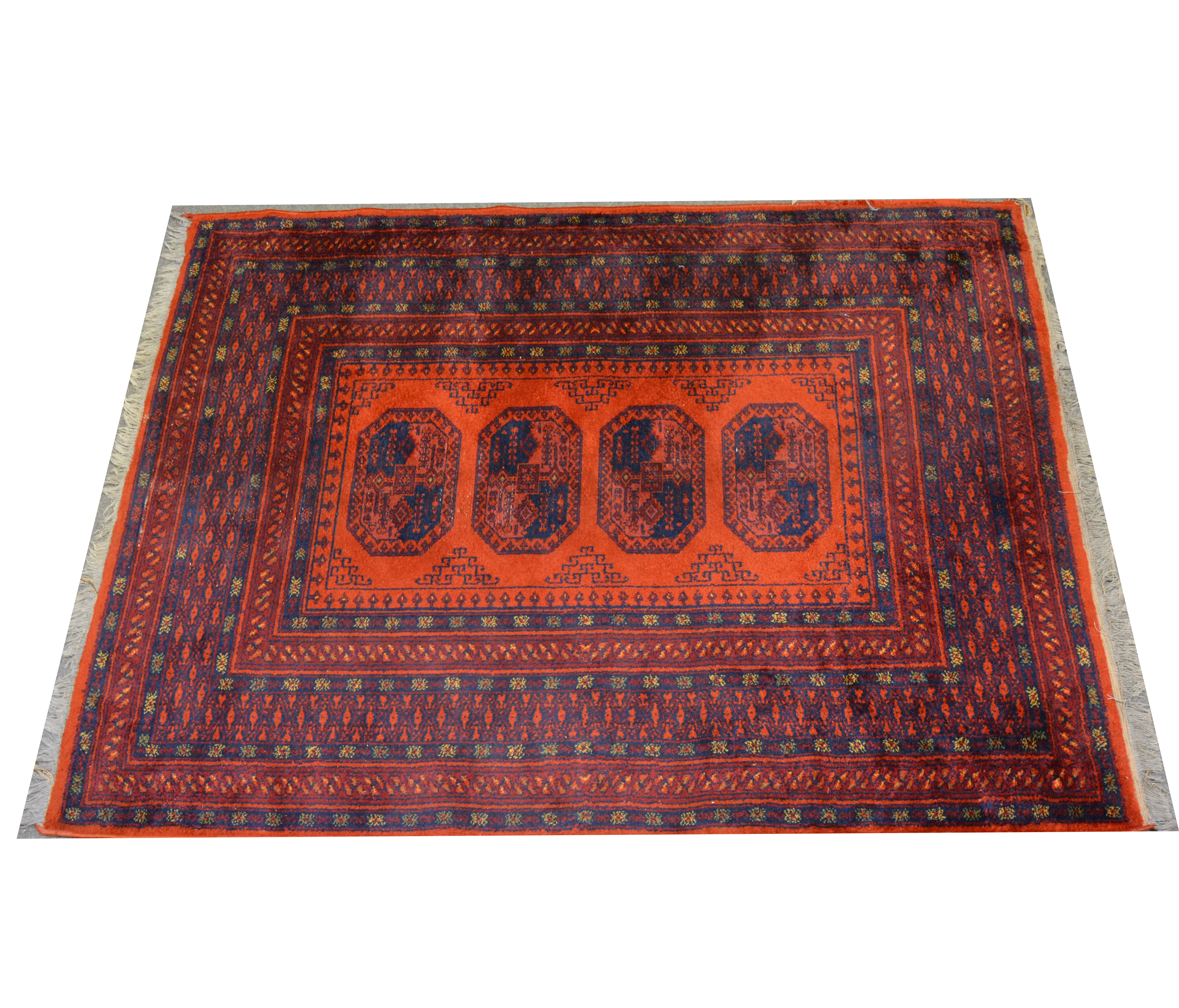 Bokhara rug, four guls on a red ground, multi-bordered, 175 x 136cms.