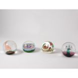 Seven late 20th century glass paperweights, including Caithness, Zellique and R P Golding.
