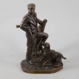 A contemporary bronze finish model of a country gent with gun and dog, height 26cm.