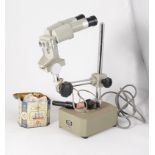 A Griffin binocular microscope, with illumination.