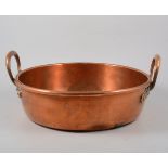 Large copper jam pan, along with silver-plated entree dishes.