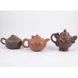 Yixing style teapot, slightly lobed circular form, decorated with dragons,
