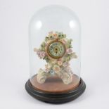 Continental porcelain mantel clock, floral encrusted case, under a glass dome,