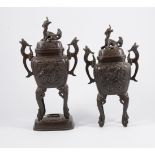 Chinese bronze censor, cast foliate decoration, raised on four scrolled feet, set on a plinth,