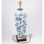 A modern blue and white ceramic table lamp with cream shade, 46cm high,