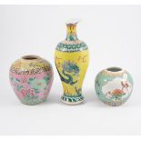 Chinese yellow ground baluster shape vase, decorated with dragons chasing a flaming pearl, damaged,