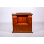 Treadle sewing machine by Singer, fitted in an oak sewing cabinet, width 82cm, depth 46cm,