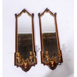 Pair of Edwardian mahogany girandole, bevelled plates, with carved parcel gilt slips,