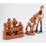 Italian Grasso terracotta group, figures at a table, 16cm; another grasso terracotta model,