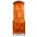 Continental walnut cabinet by Faber, arched top with cavetto moulded cornice,